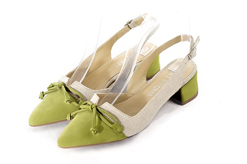 Pistachio green and natural beige women's open back shoes, with a knot. Tapered toe. Low flare heels. Front view - Florence KOOIJMAN